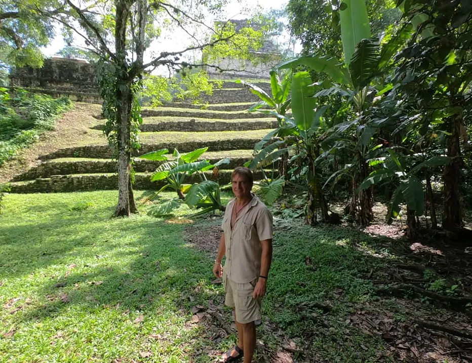 Standing among the stepped Mayan ruins of Palenque, Chiapas, surrounded by jungle